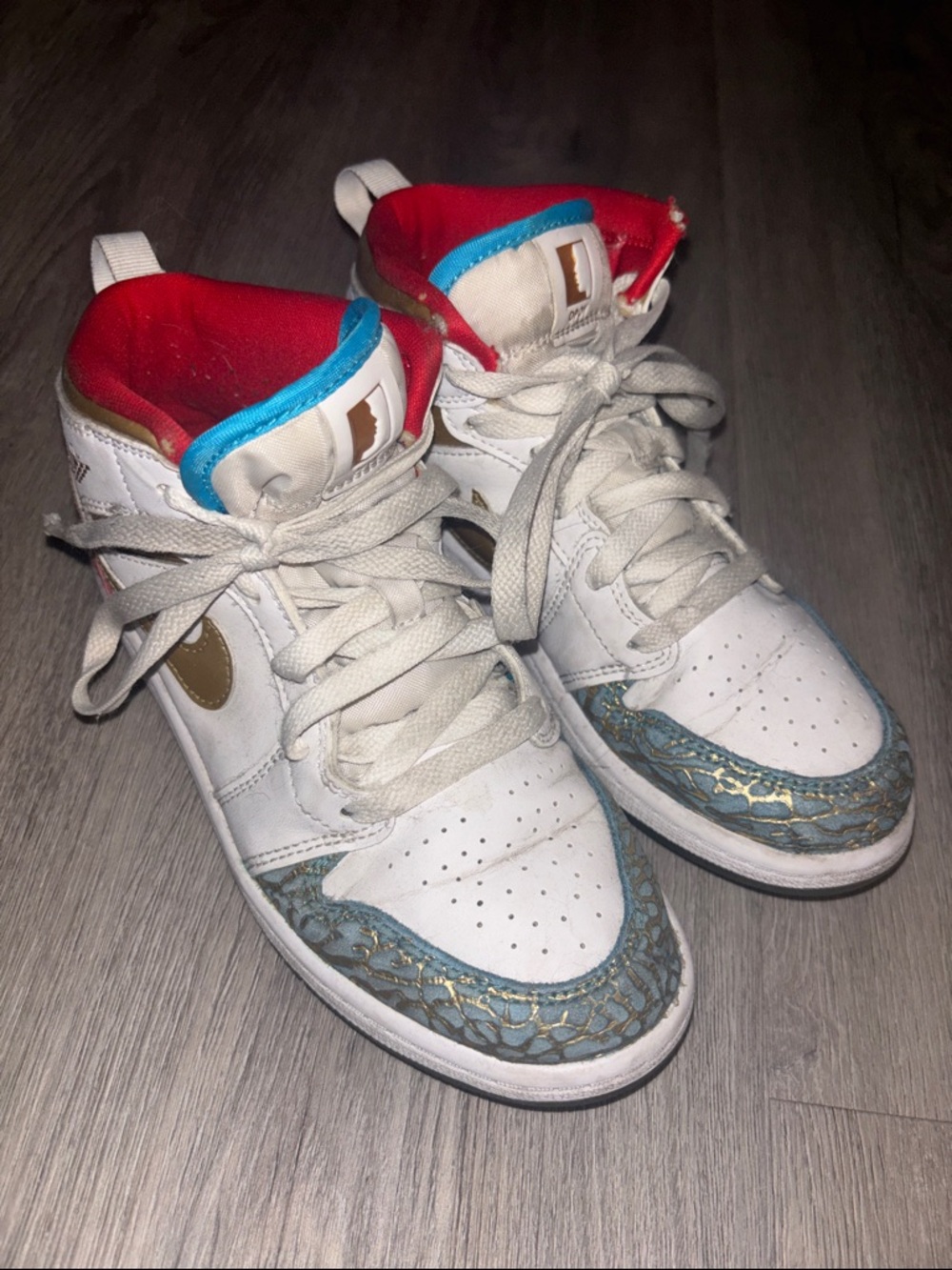 Nike Kids White High-Top Sneakers with Teal & Red Accents